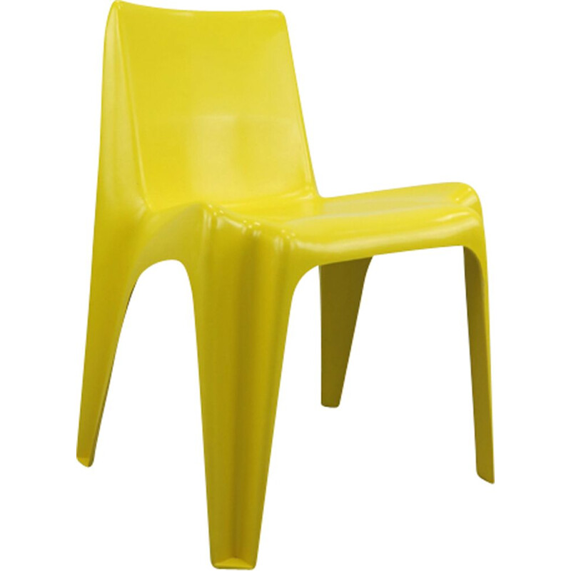 Yellow chair in fiberglass by Helmut Bätzner