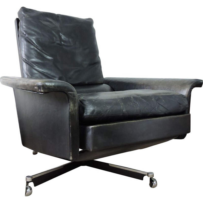 Vintage black leather swivelling armchair 1960