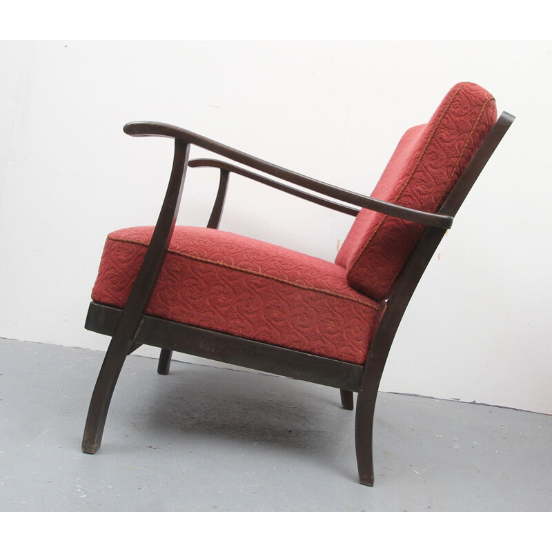 Vintage armchair in pale red