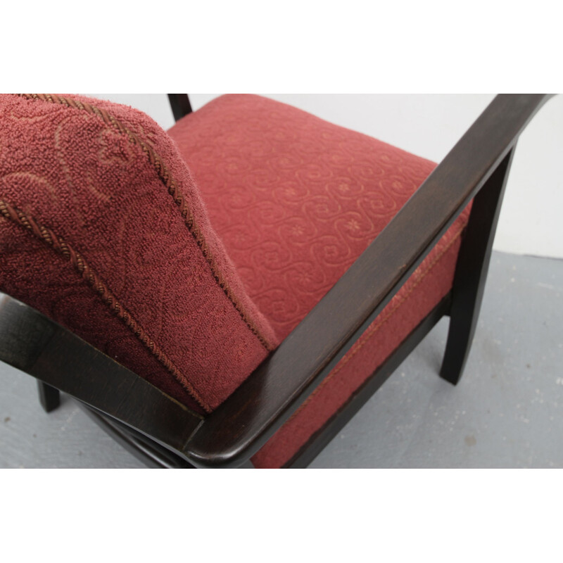 Vintage armchair in pale red