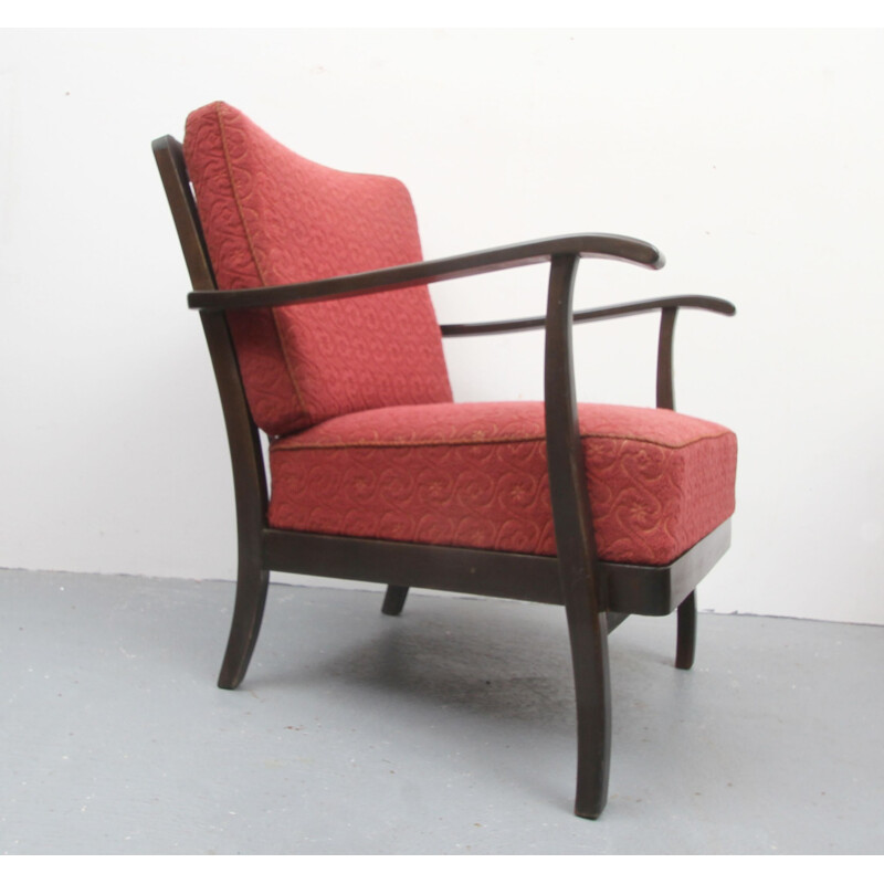 Vintage armchair in pale red