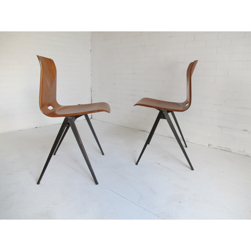 Suite de 4 chaises industrielles en bois et métal - 1960