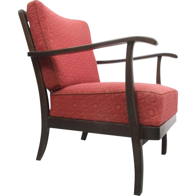 Vintage armchair in pale red