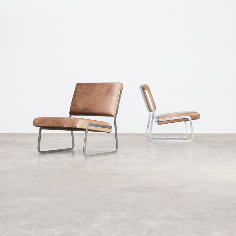 Pair of Paul Sumi steel framed leather lounge chairs for Lübke & Rolf
