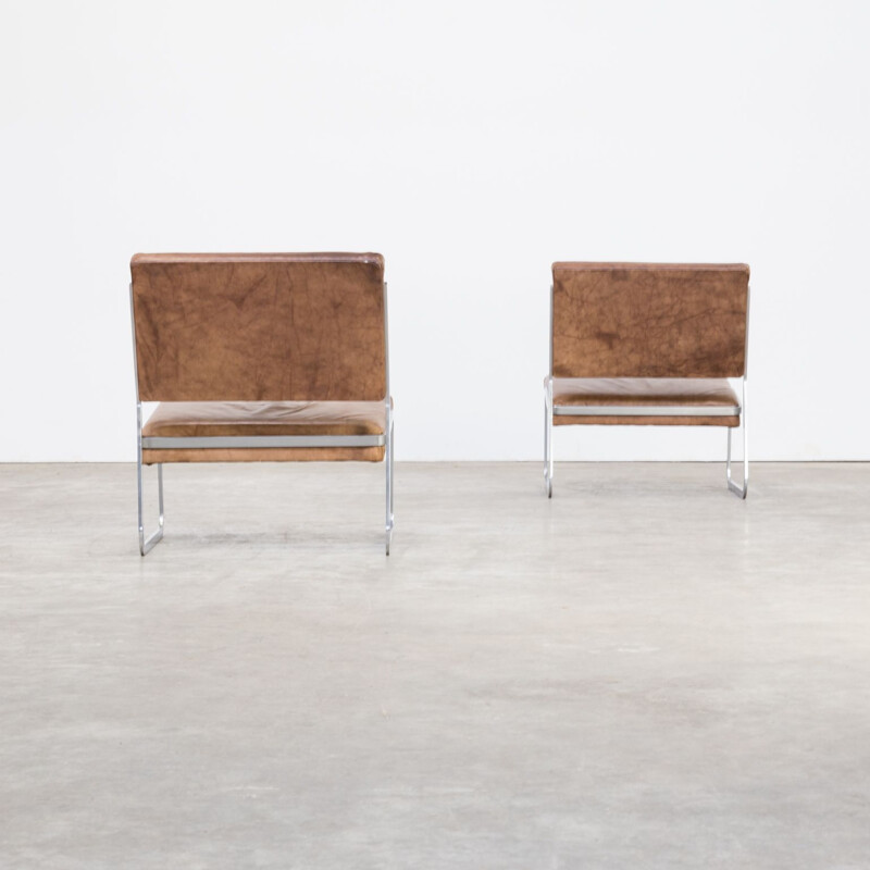 Pair of Paul Sumi steel framed leather lounge chairs for Lübke & Rolf