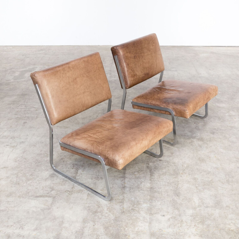 Pair of Paul Sumi steel framed leather lounge chairs for Lübke & Rolf