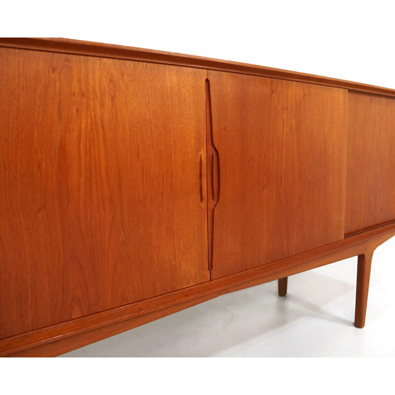 Vintage teak sideboard with sliding doors