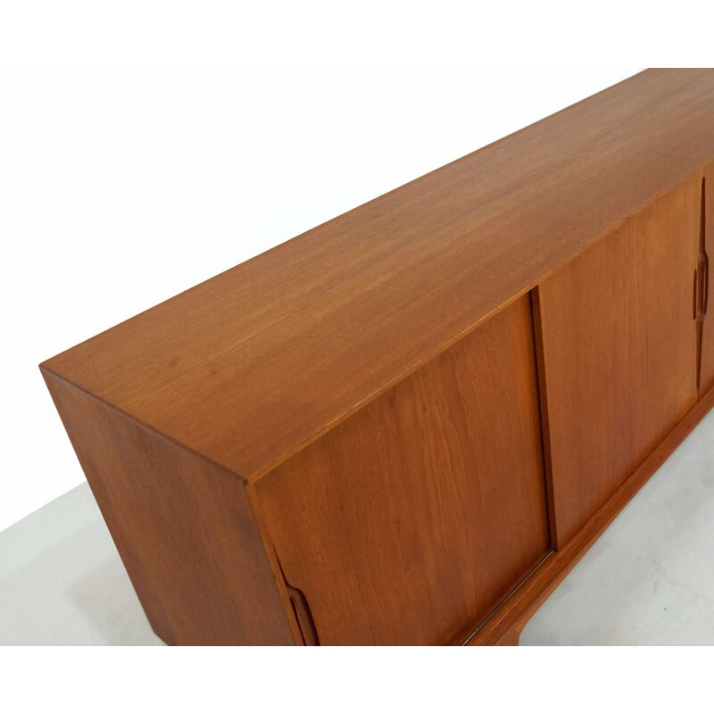 Vintage teak sideboard with sliding doors