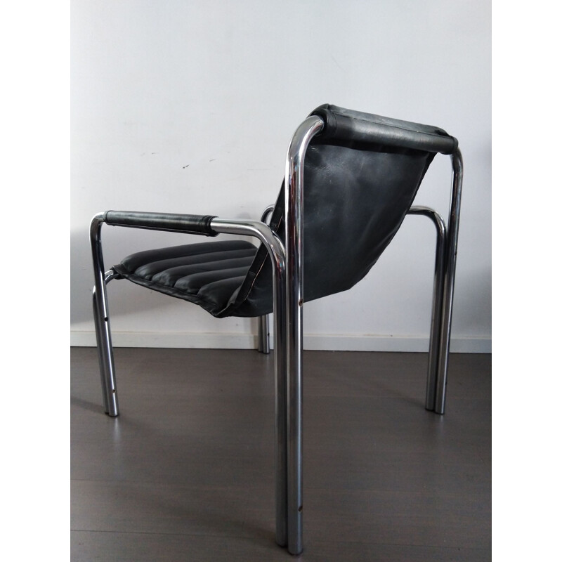 Black vintage leather lounge chair by Baroumand 1980