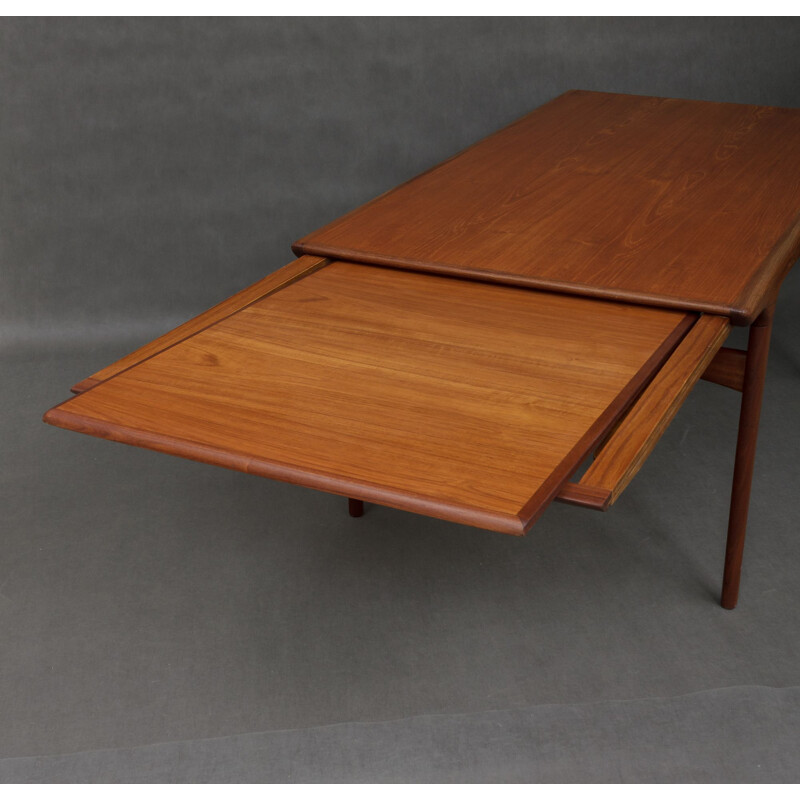 Vintage teak extension table by Johannes Andersen