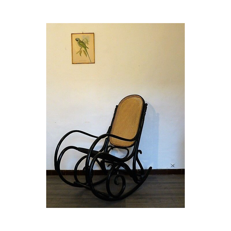 Zwarte houten schommelstoel met rieten zitting 1960