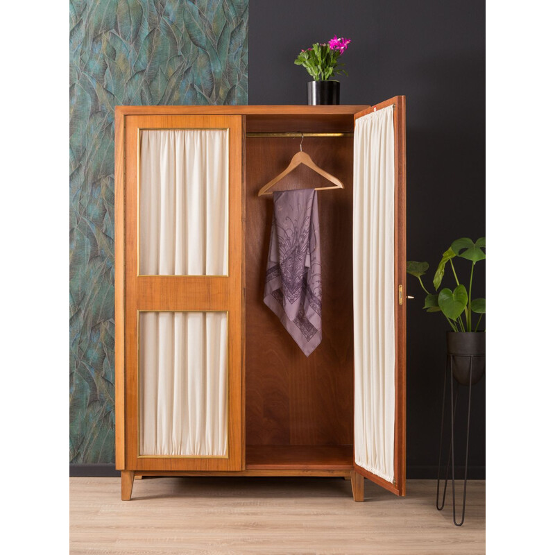 Vintage wardrobe for Musterring in walnut and with curtains 1950s