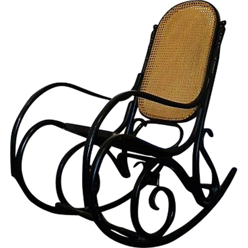 Silla mecedora de madera negra con asiento de caña 1960