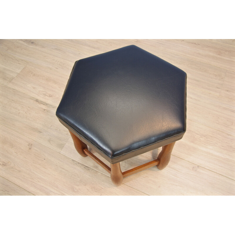 Vintage foostool in teak and black leatherette