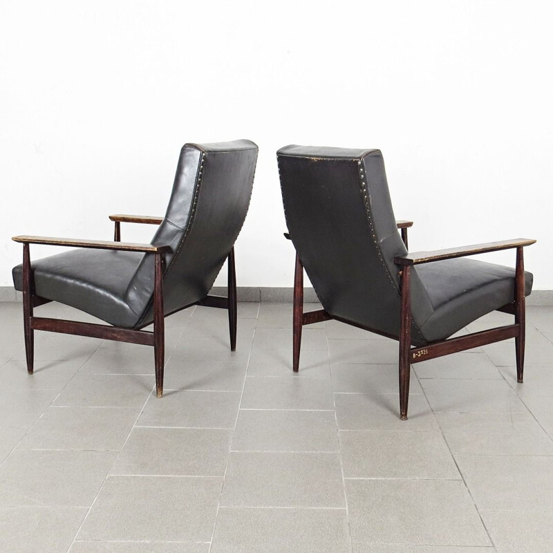Set of 2 vintage leather armchairs in black leather and wood 1970