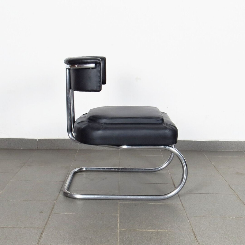 Vintage small tubular armchair in black leather and metal 1930