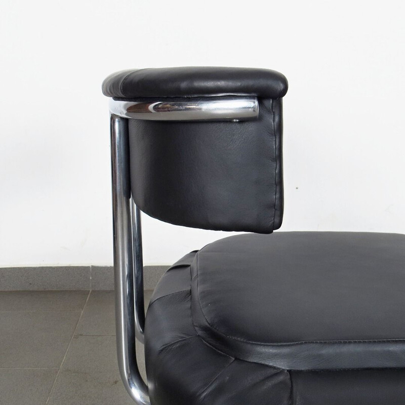 Vintage small tubular armchair in black leather and metal 1930
