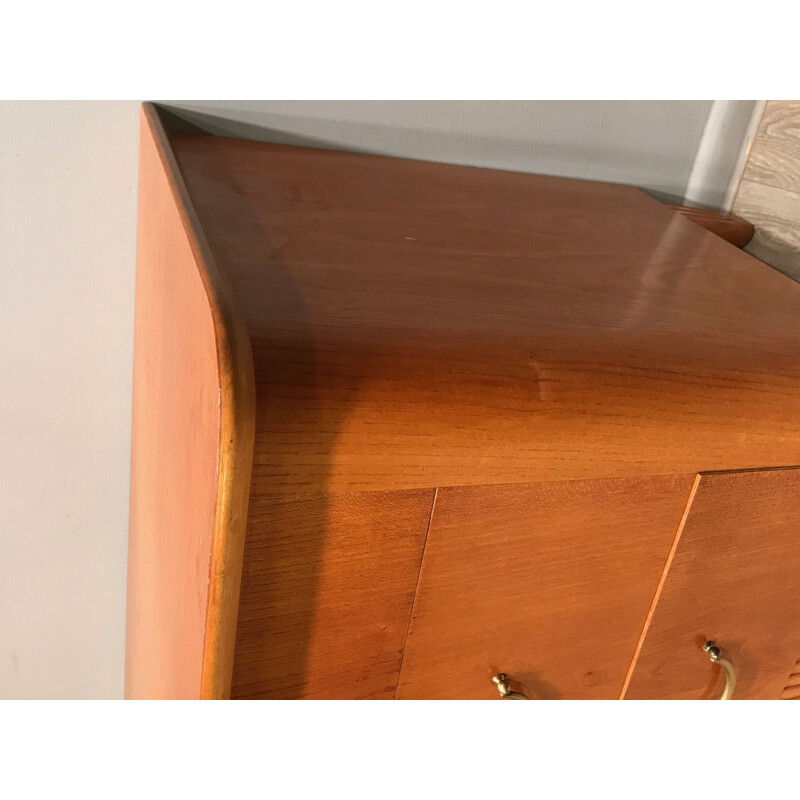 Wooden chest of drawers with brass handles