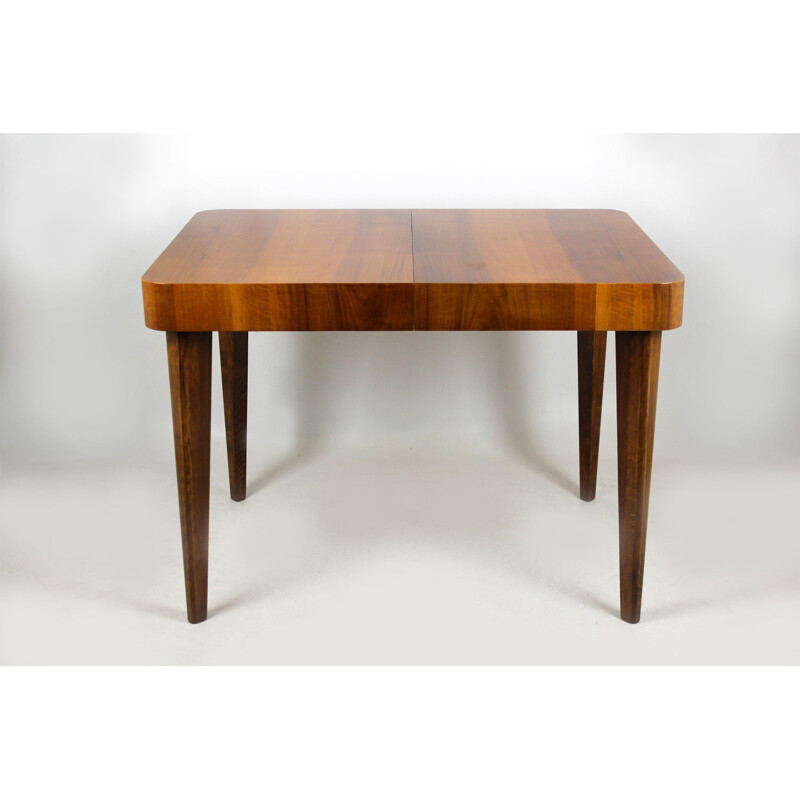 Walnut folding table by Jindrich Halabala