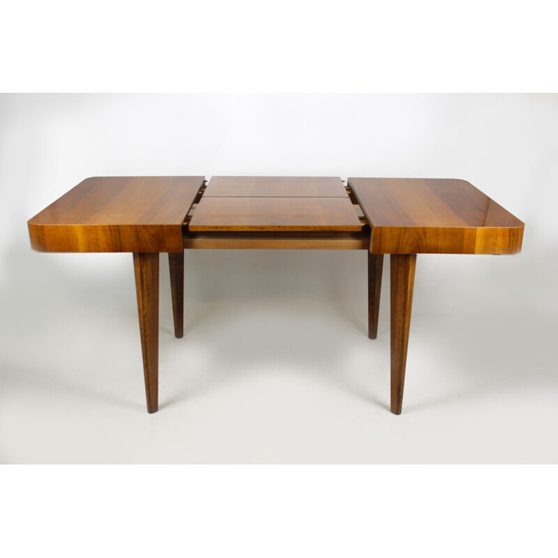 Walnut folding table by Jindrich Halabala