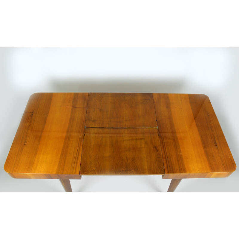 Walnut folding table by Jindrich Halabala