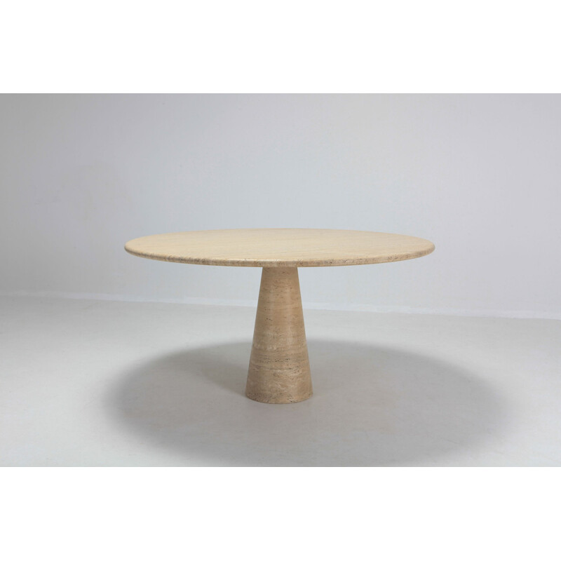 Round table in travertine by Angelo Mangiarotti