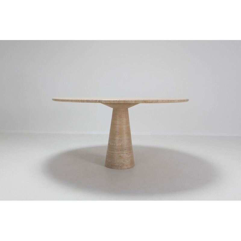 Round table in travertine by Angelo Mangiarotti