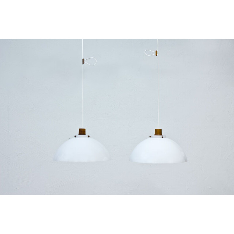 Pair of white pendant lamps by Kristiansson