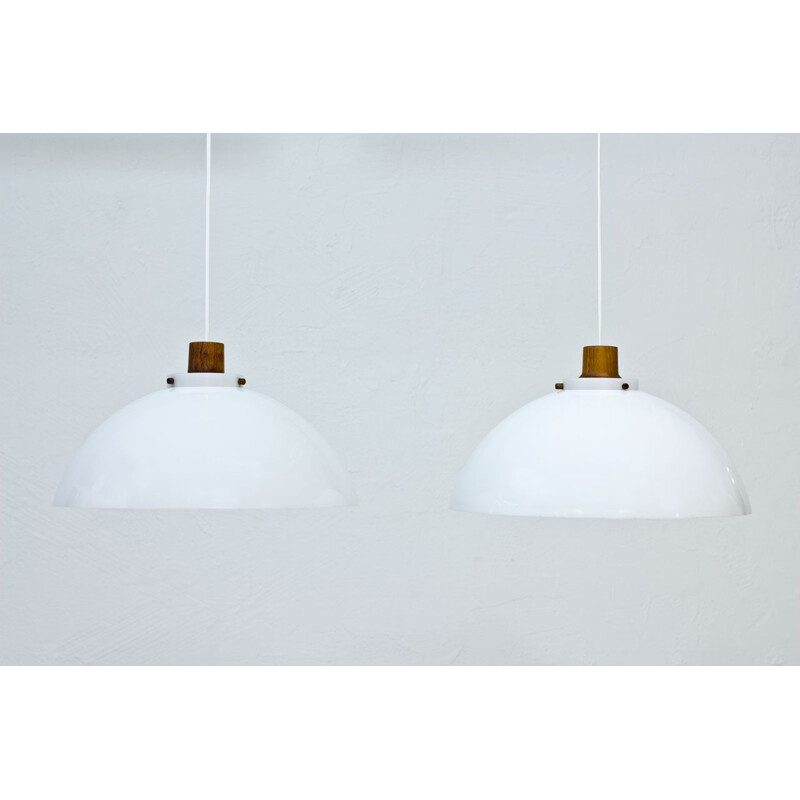 Pair of white pendant lamps by Kristiansson