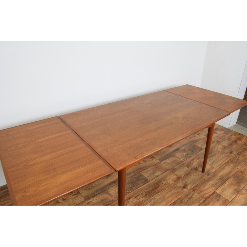 Extendable teak dining table by Omann Jun