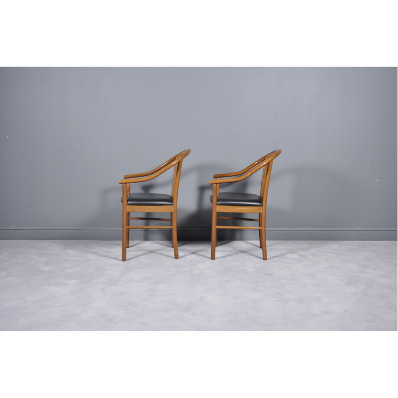 Pair of wooden side chairs by Consorzio