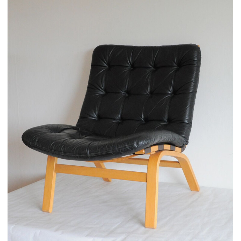 Danish armchair in beech and black leather
