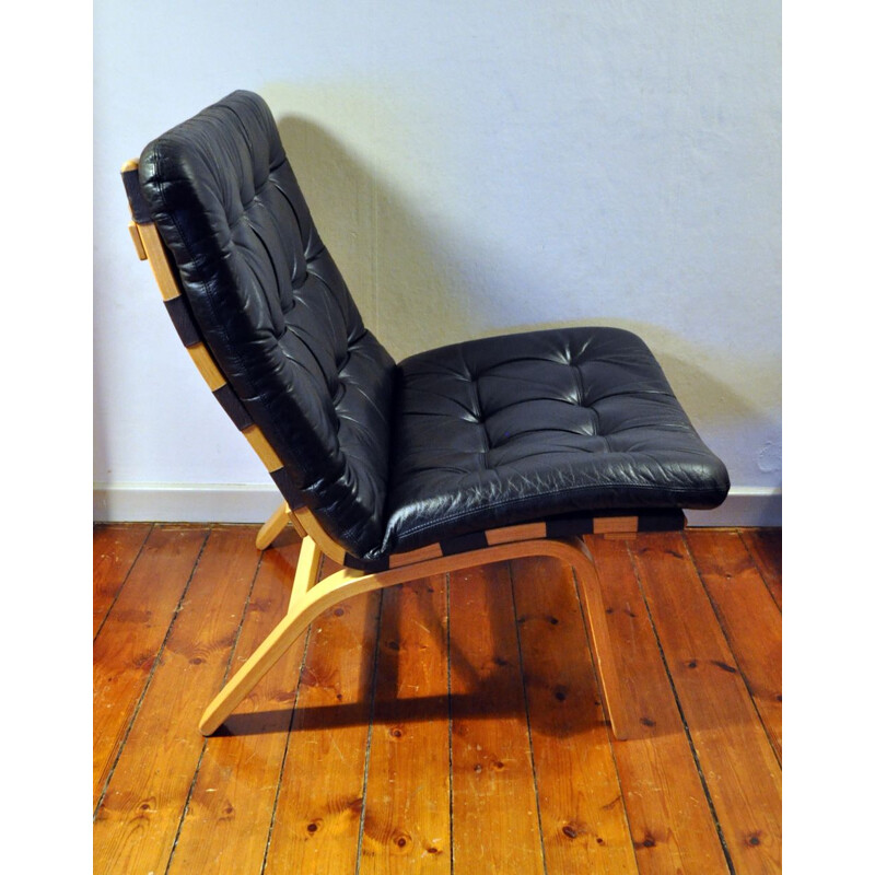 Danish armchair in beech and black leather