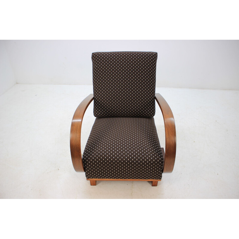 Vintage armchair by Halabala in walnut and black fabric