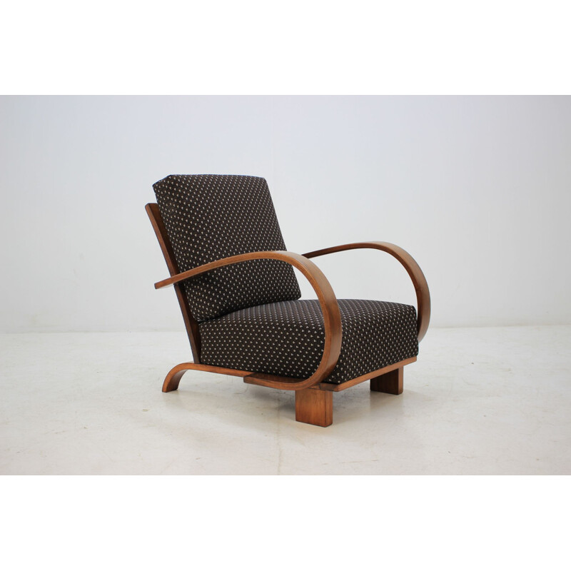 Vintage armchair by Halabala in walnut and black fabric