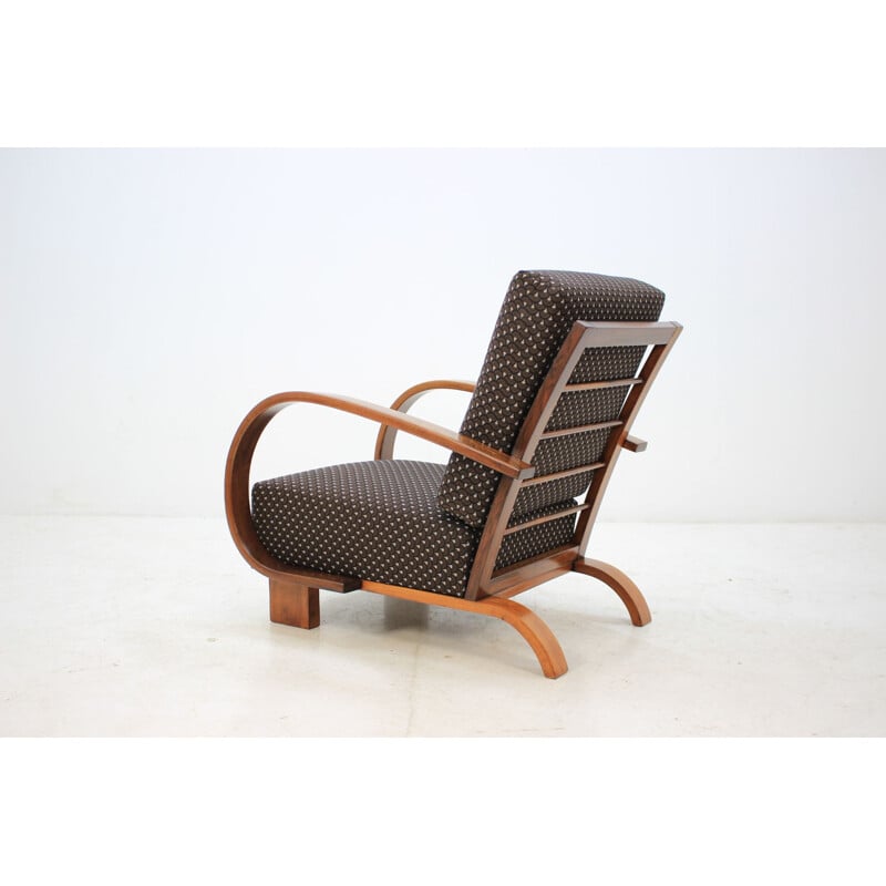 Vintage armchair by Halabala in walnut and black fabric