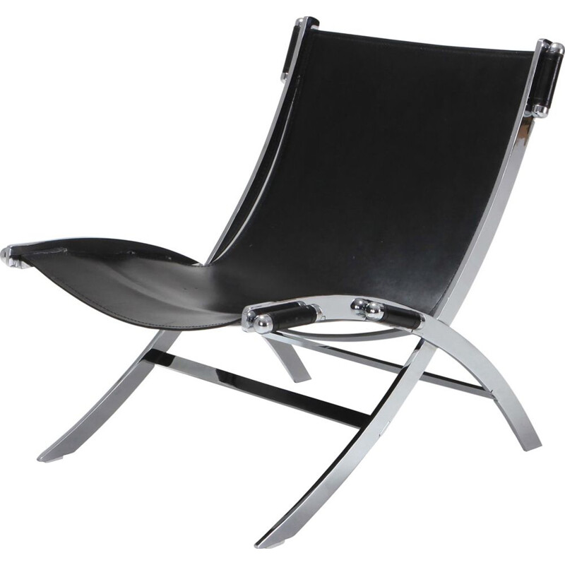 Vintage lounge chair in metal and black leather