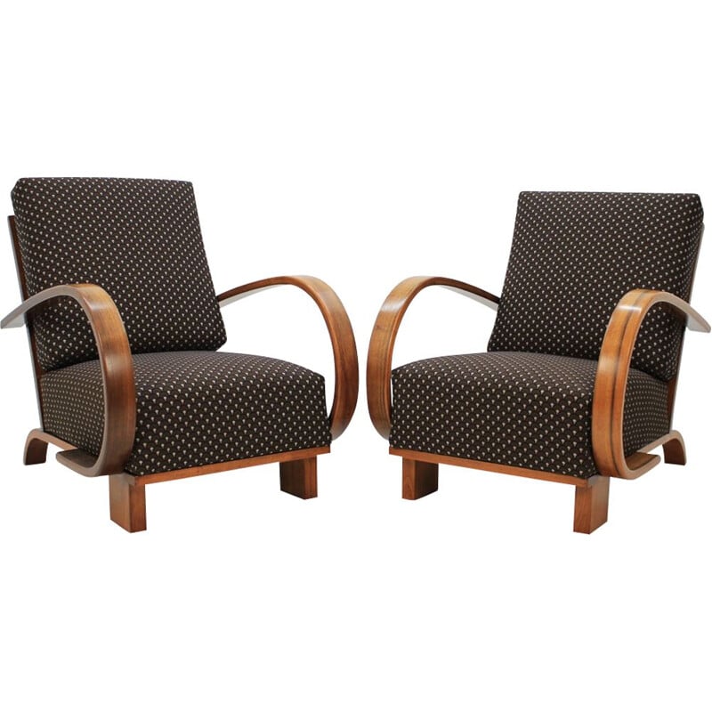 Pair of walnut armchairs by Jindrich Halabala