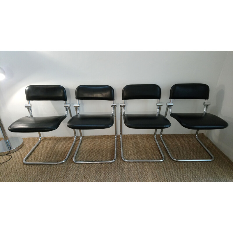 Set of 4 vintage chairs in black leatherette and chrome 1970