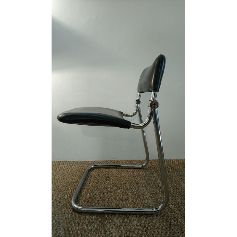 Set of 4 vintage chairs in black leatherette and chrome 1970