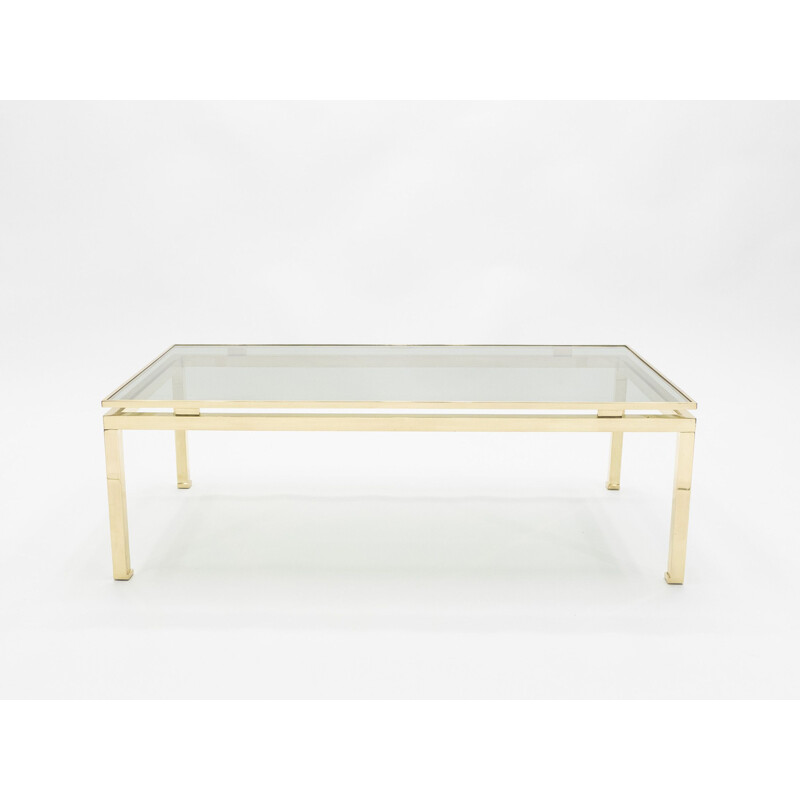 Coffee table in glass and brass by Guy Lefevre for Maison Jansen 1970s