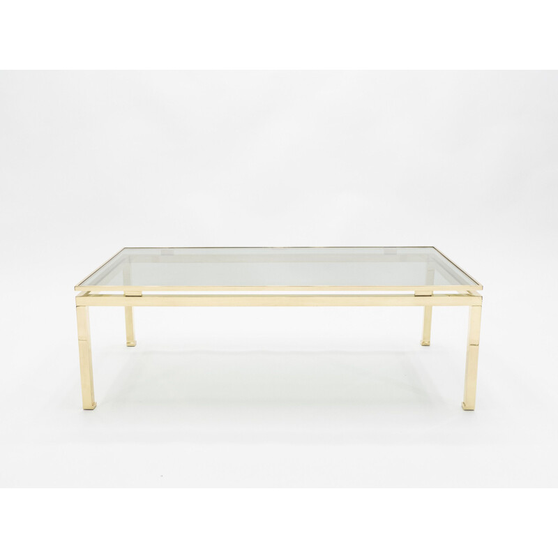 Coffee table in glass and brass by Guy Lefevre for Maison Jansen 1970s