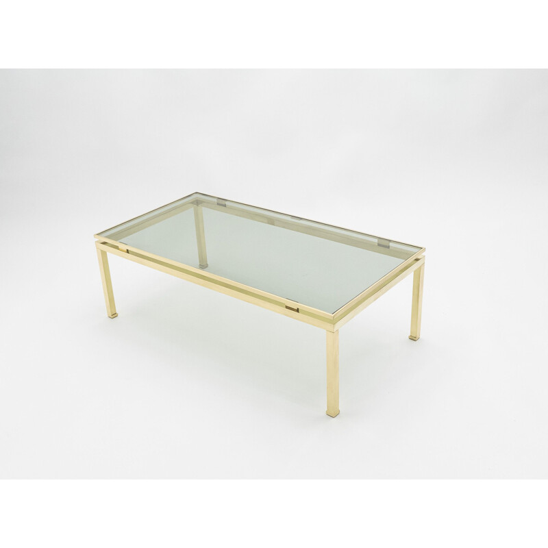 Coffee table in glass and brass by Guy Lefevre for Maison Jansen 1970s