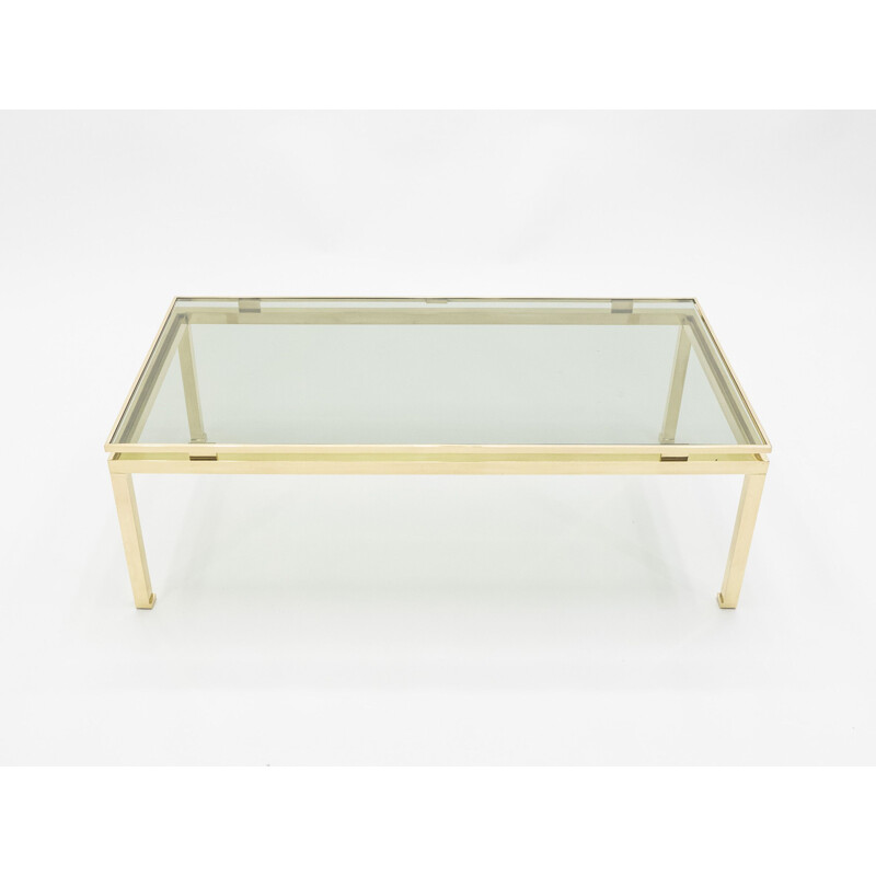 Coffee table in glass and brass by Guy Lefevre for Maison Jansen 1970s