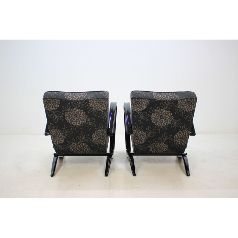 Pair of black H-269 armchairs by Jindrich Halabala