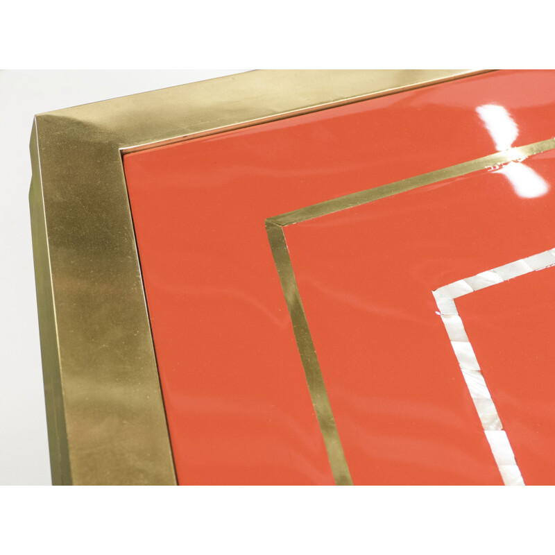 Vintage red lacquered table in brass 1970