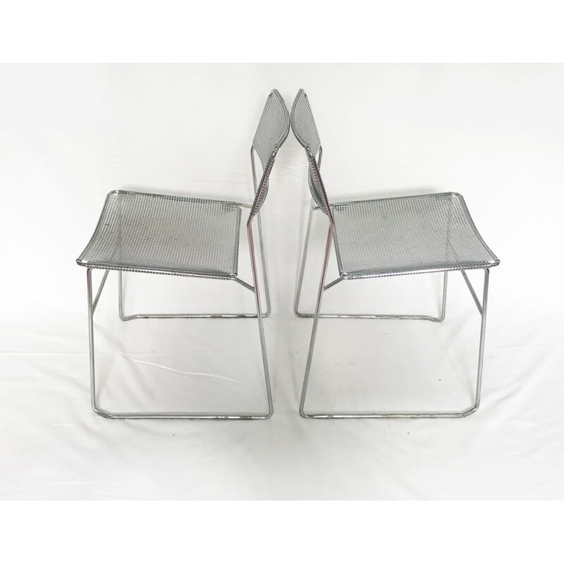 Set of 2 perforated chromed steel chairs by Niels Jorgen Haugesen for Magis