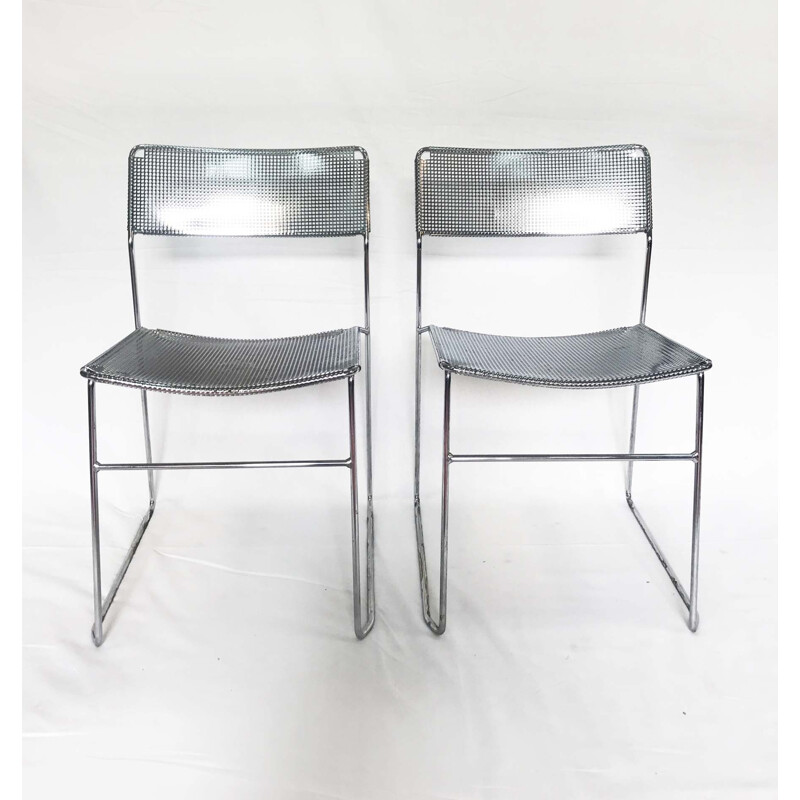 Set of 2 perforated chromed steel chairs by Niels Jorgen Haugesen for Magis