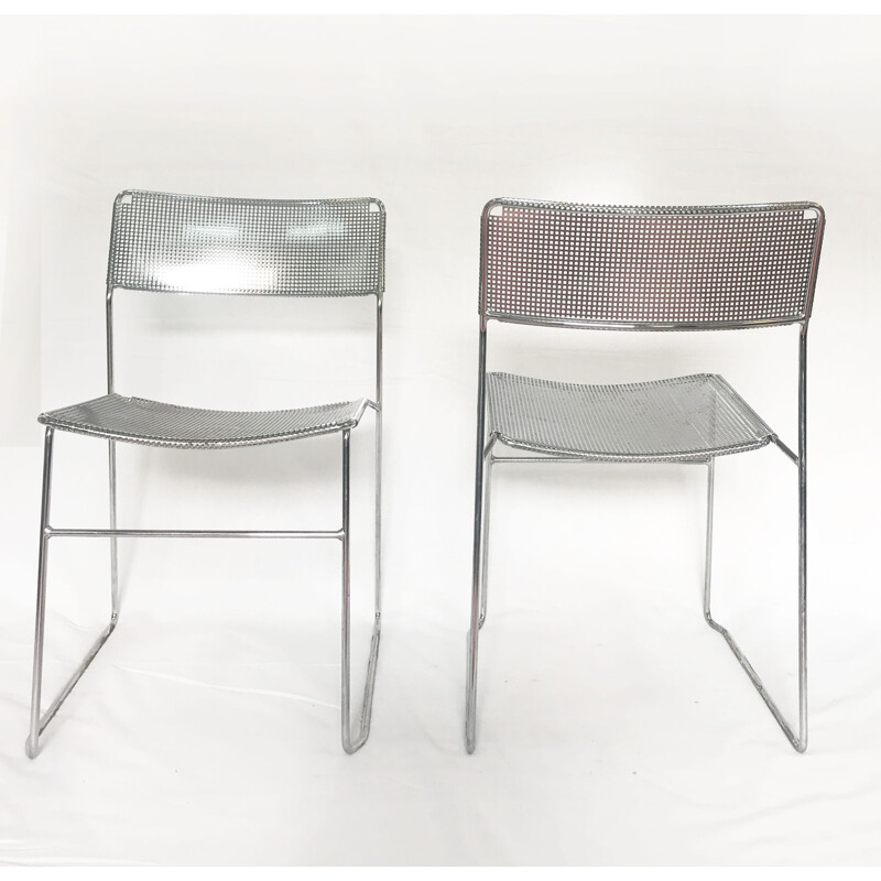 Set of 2 perforated chromed steel chairs by Niels Jorgen Haugesen for Magis