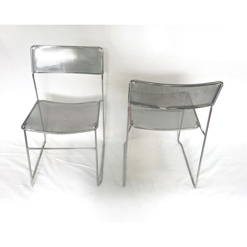 Set of 2 perforated chromed steel chairs by Niels Jorgen Haugesen for Magis